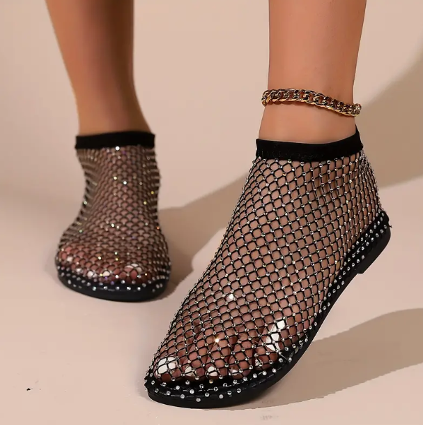 Kändisars platta sandaler med dekor av strass