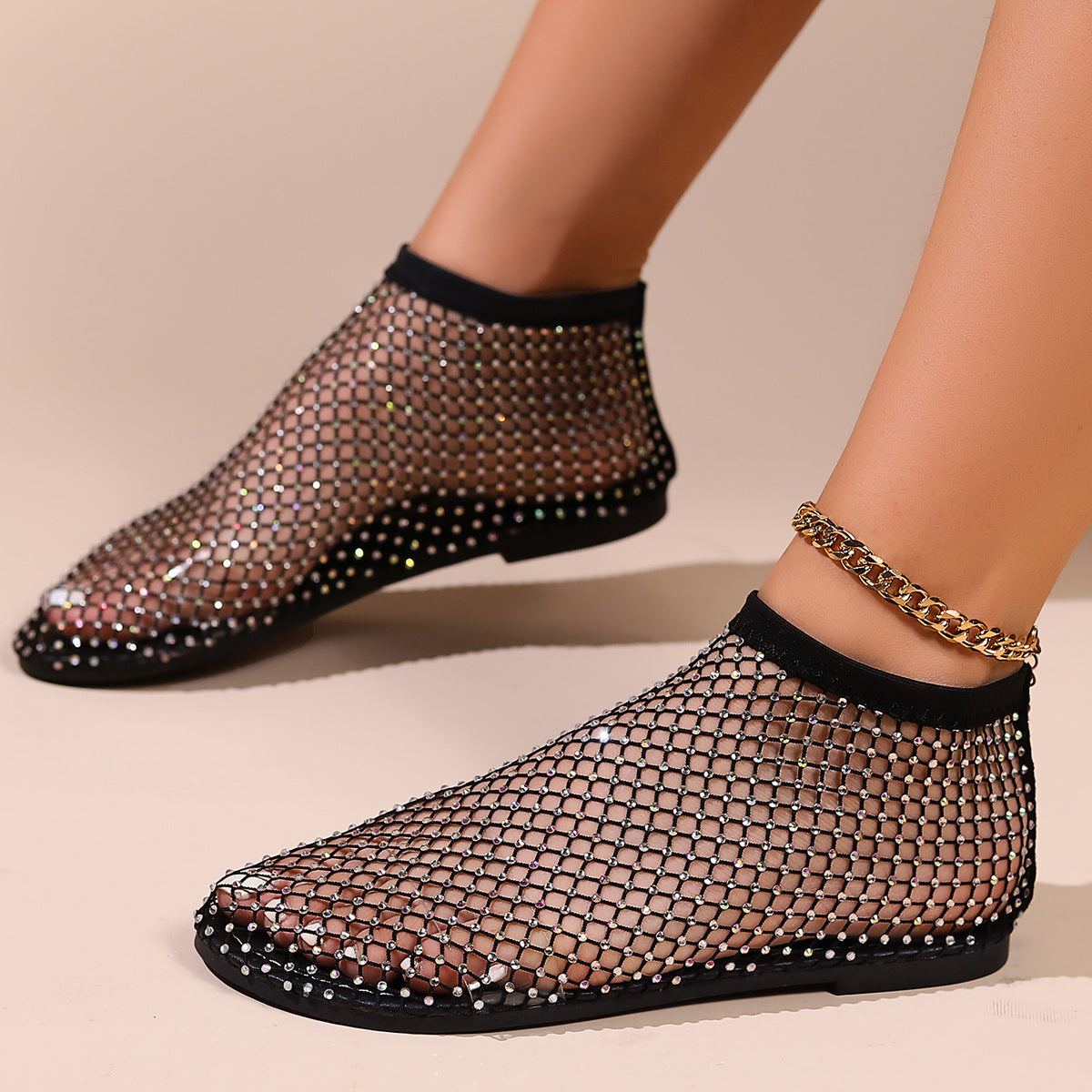 Kändisars platta sandaler med dekor av strass